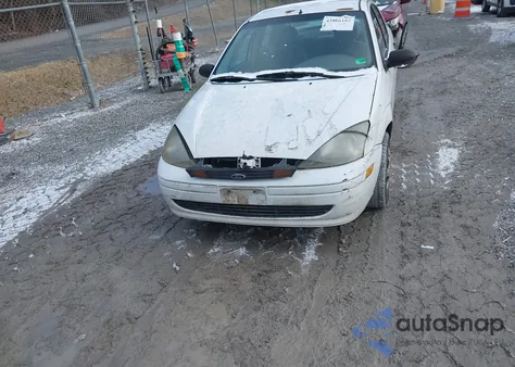 2004 Ford Focus Lx z USA, uszkodzony, nr VIN 1FAFP33P44W195187